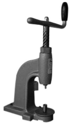 Machine bouton astor tapissier